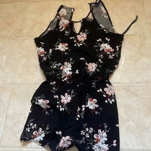 Flowery Romper . Use only once. Aeropostale . Size XS